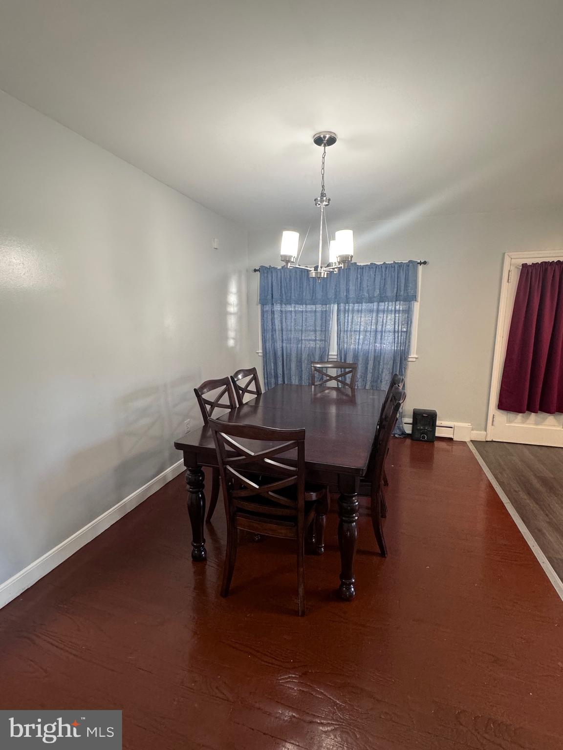3250 Broad Hamilton, NJ 08610 - Photo 26 of 43 a view of a dining room with furniture wooden floor and chandelier