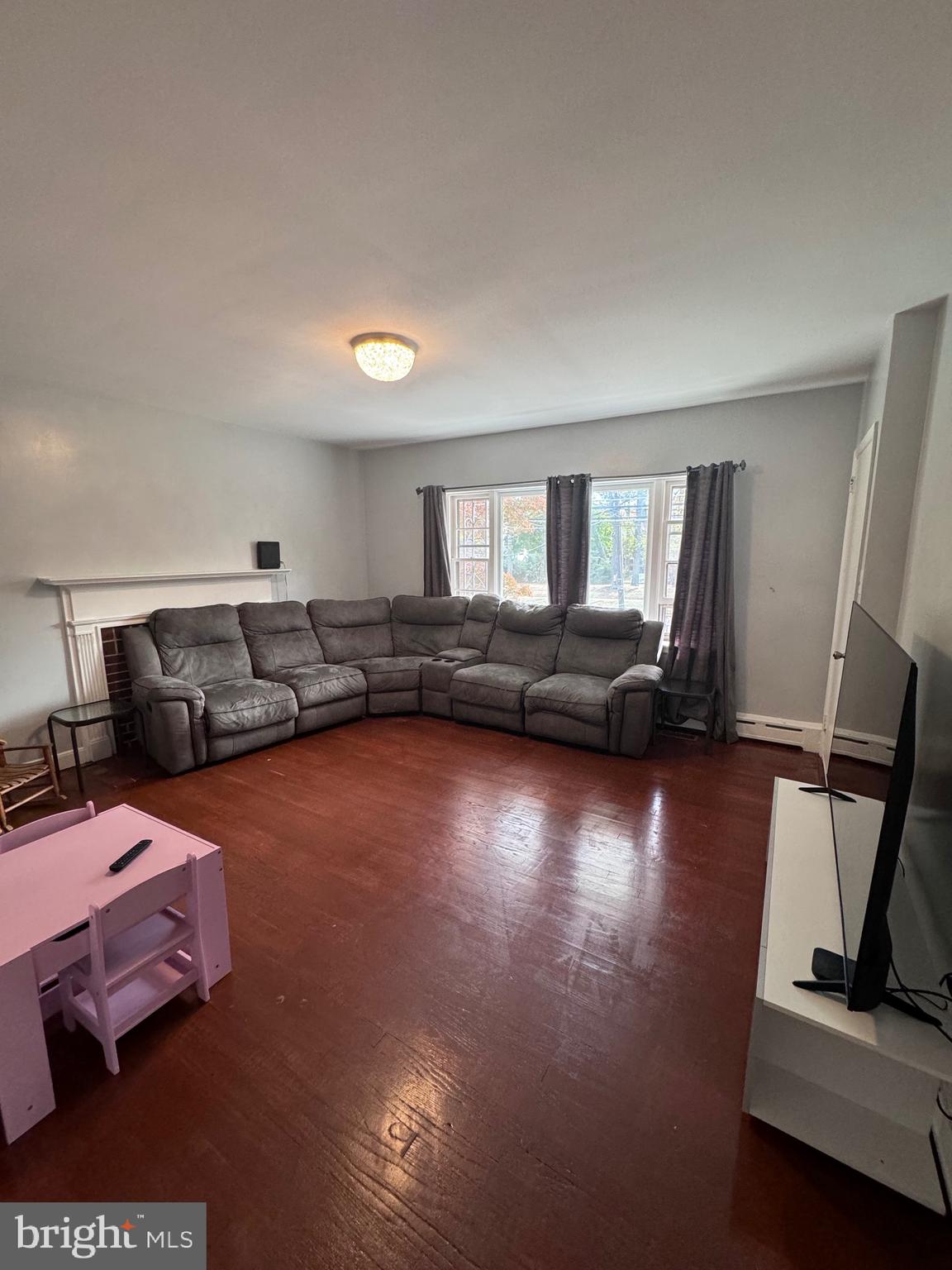 3250 Broad Hamilton, NJ 08610 - Photo 28 of 43 a living room with furniture and a flat screen tv