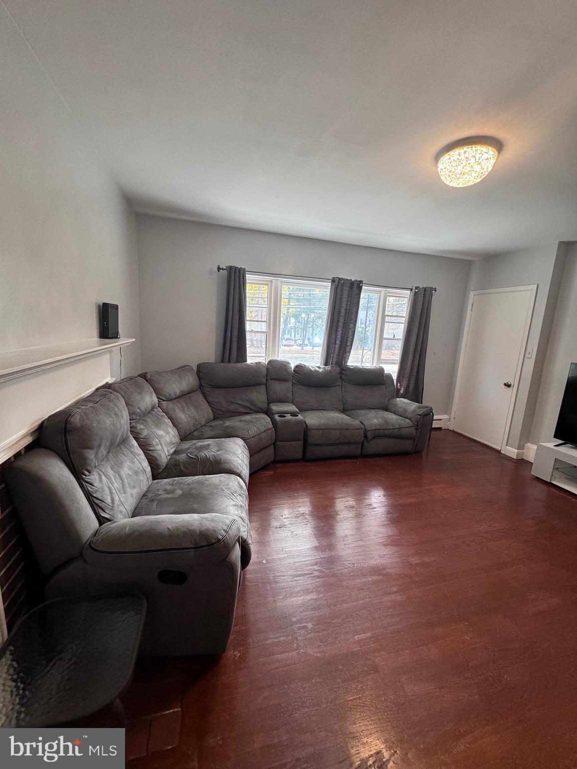 3250 Broad Hamilton, NJ 08610 - Photo 30 of 43 a living room with furniture and a window