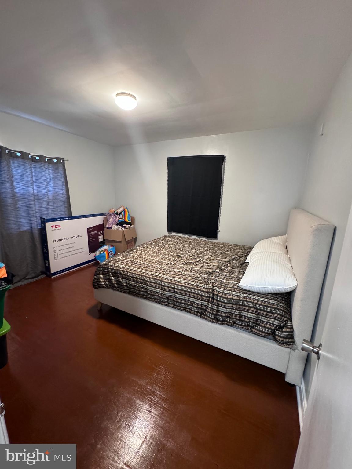 3250 Broad Hamilton, NJ 08610 - Photo 40 of 43 a bedroom with a bed and wooden floor