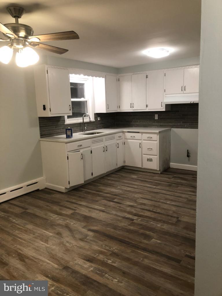 3250 Broad Hamilton, NJ 08610 - Photo 4 of 43 a large white kitchen with cabinets