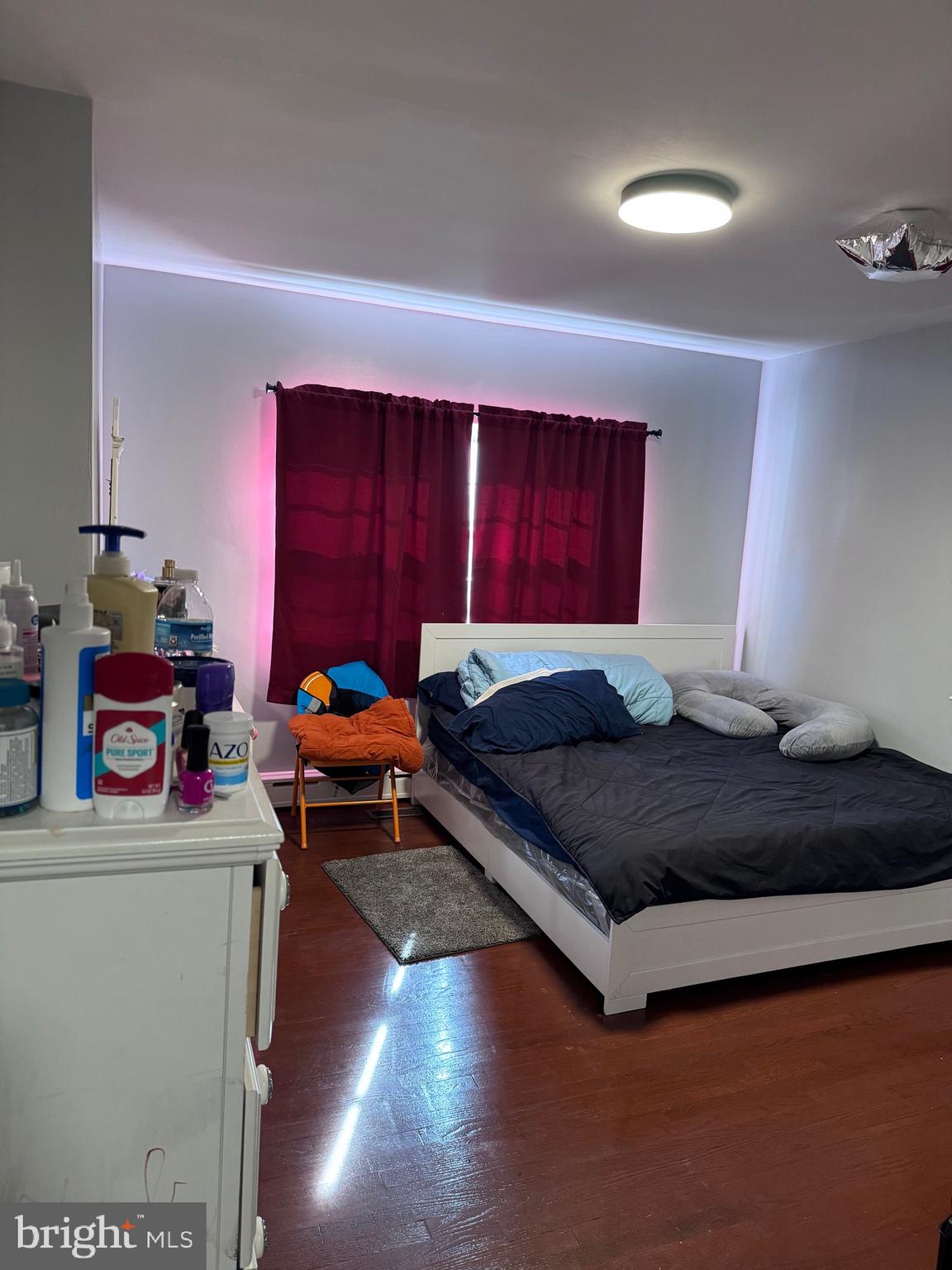 3250 Broad Hamilton, NJ 08610 - Photo 42 of 43 a bedroom with a bed and wooden floor