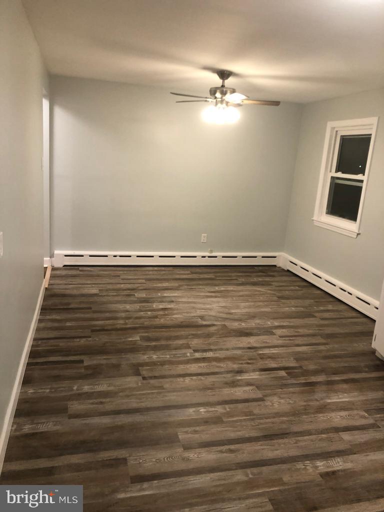 3250 Broad Hamilton, NJ 08610 - Photo 6 of 43 a view of an empty room with wooden floor