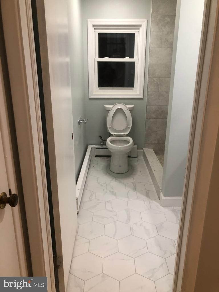 3250 Broad Hamilton, NJ 08610 - Photo 9 of 43 a bathroom with a sink and a toilet