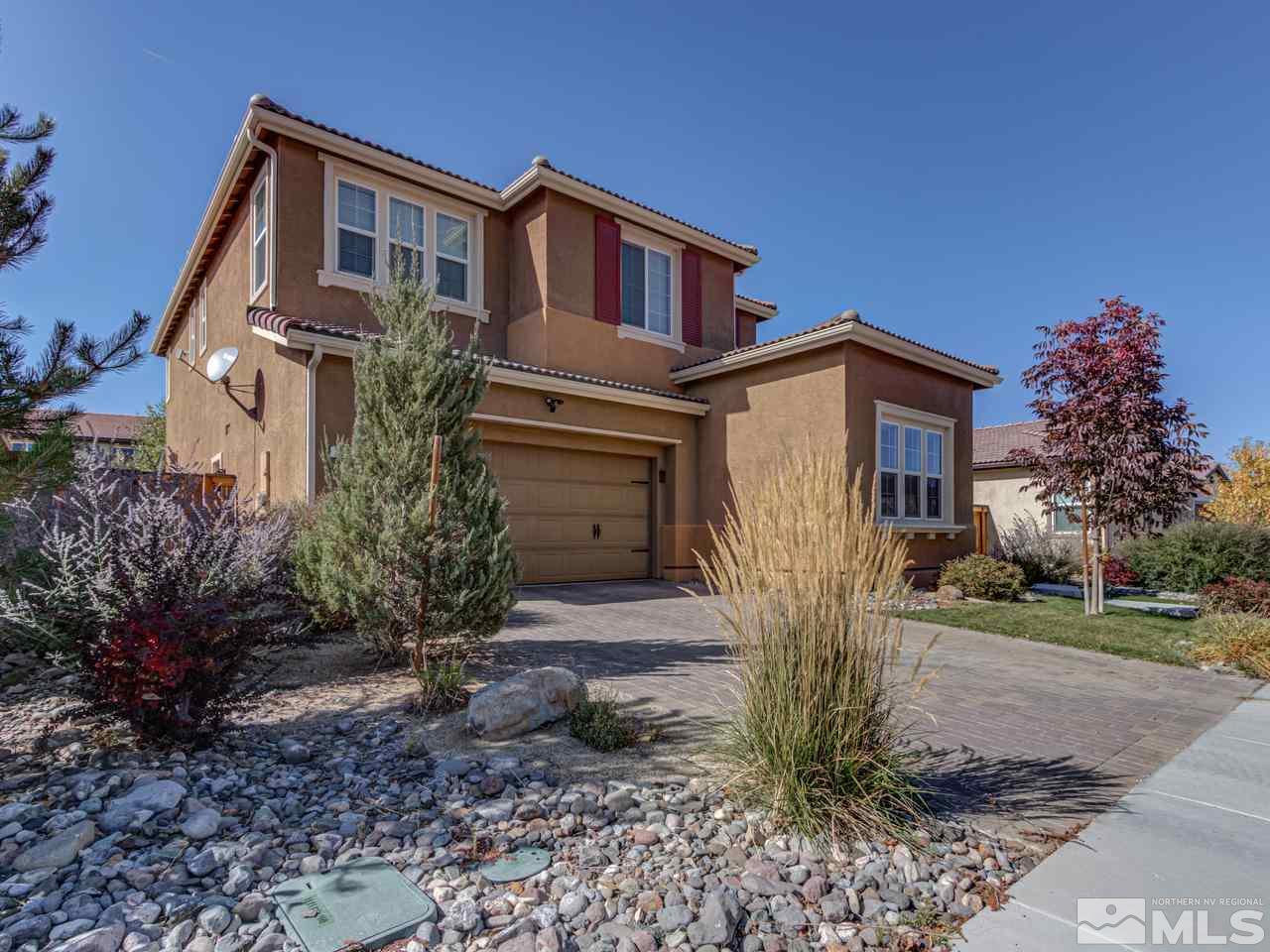 2075 Tawleed Road Reno, NV 89521 - Photo 1 of 24 a front view of a house with garden
