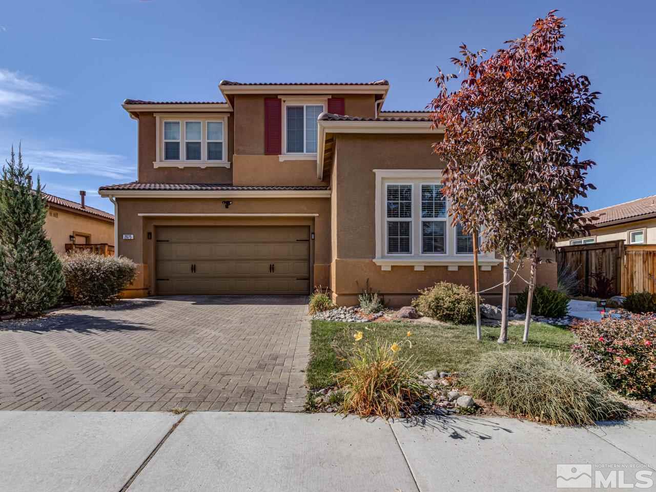 2075 Tawleed Road Reno, NV 89521 - Photo 2 of 24 a front view of a house with a yard