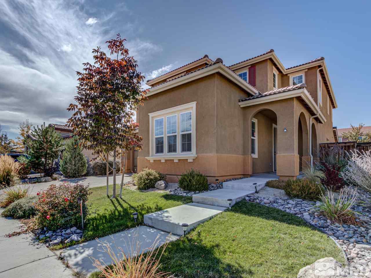 2075 Tawleed Road Reno, NV 89521 - Photo 3 of 24 a front view of a house with garden