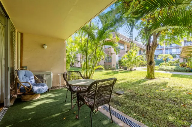 a view of an outdoor sitting area in a yard
