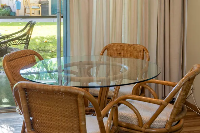 a view of balcony with furniture