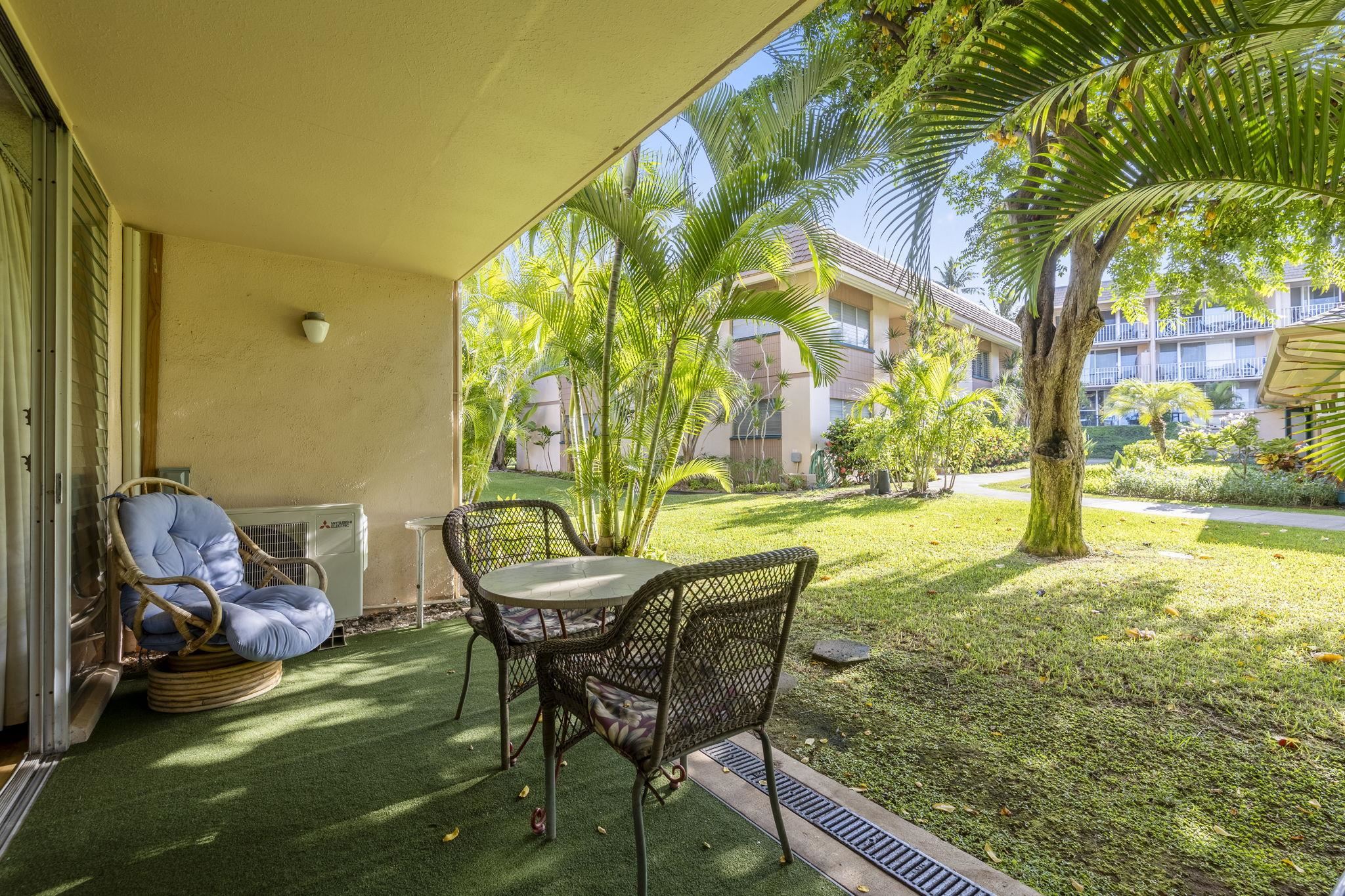2495 South Kihei Road, Unit 120 Kihei, HI 96753 - Photo 2 of 40 a view of an outdoor sitting area in a yard