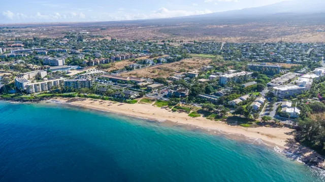 a view of a city with an ocean