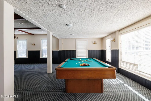 a room with furniture and a window