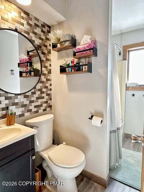 4309 Winchester Way Bushkill, PA 18324 - Photo 12 of 56 a bathroom with a sink toilet and shower
