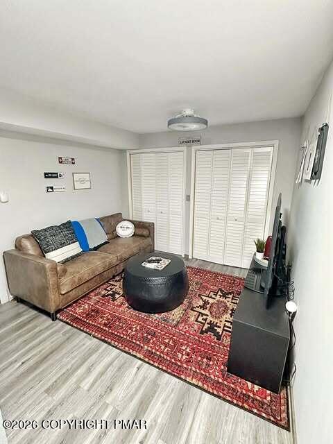 4309 Winchester Way Bushkill, PA 18324 - Photo 13 of 56 a living room with a couch and a flat screen tv