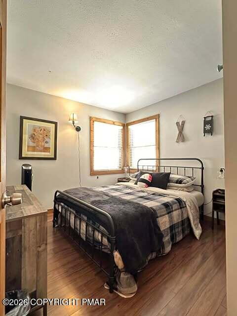 4309 Winchester Way Bushkill, PA 18324 - Photo 31 of 56 a bedroom with bed and a window