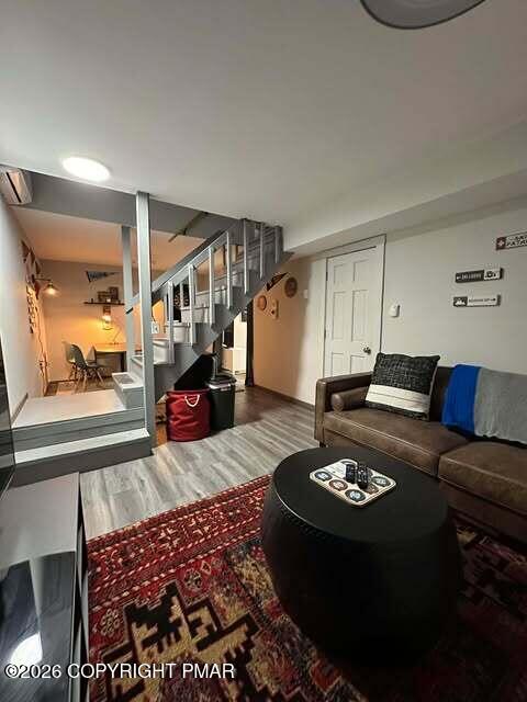 4309 Winchester Way Bushkill, PA 18324 - Photo 34 of 56 a living room with furniture and a rug