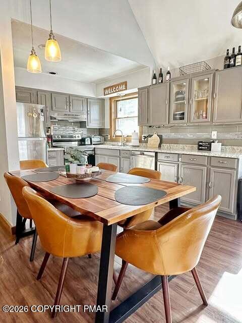 4309 Winchester Way Bushkill, PA 18324 - Photo 35 of 56 a dining table and chairs in the kitchen
