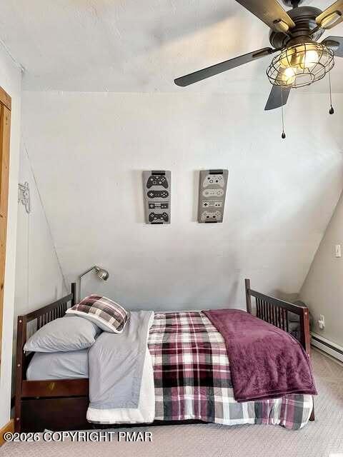 4309 Winchester Way Bushkill, PA 18324 - Photo 9 of 56 a bedroom with a bed and a painting on the wall