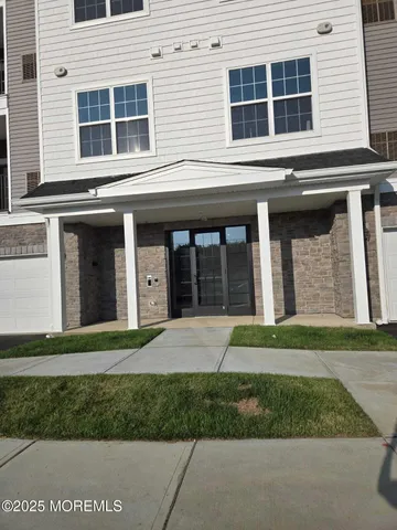 a house view with a garden space