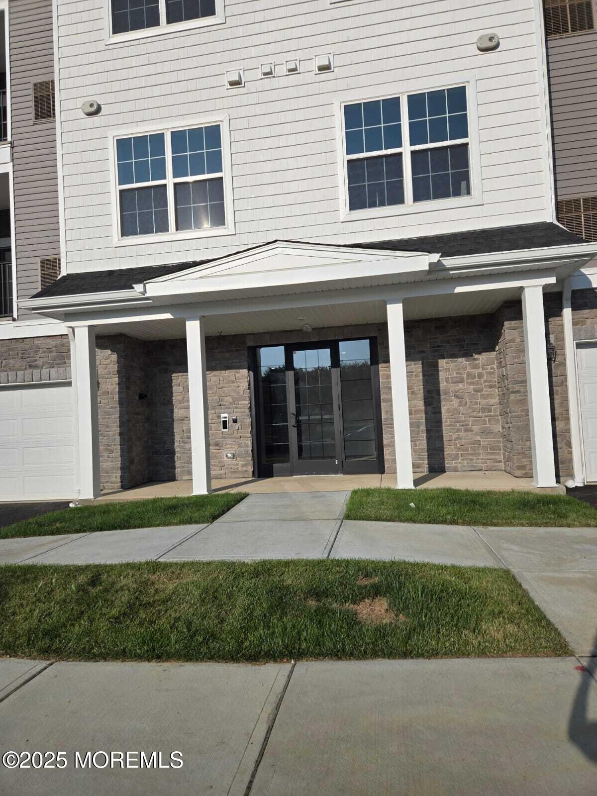 a house view with a garden space