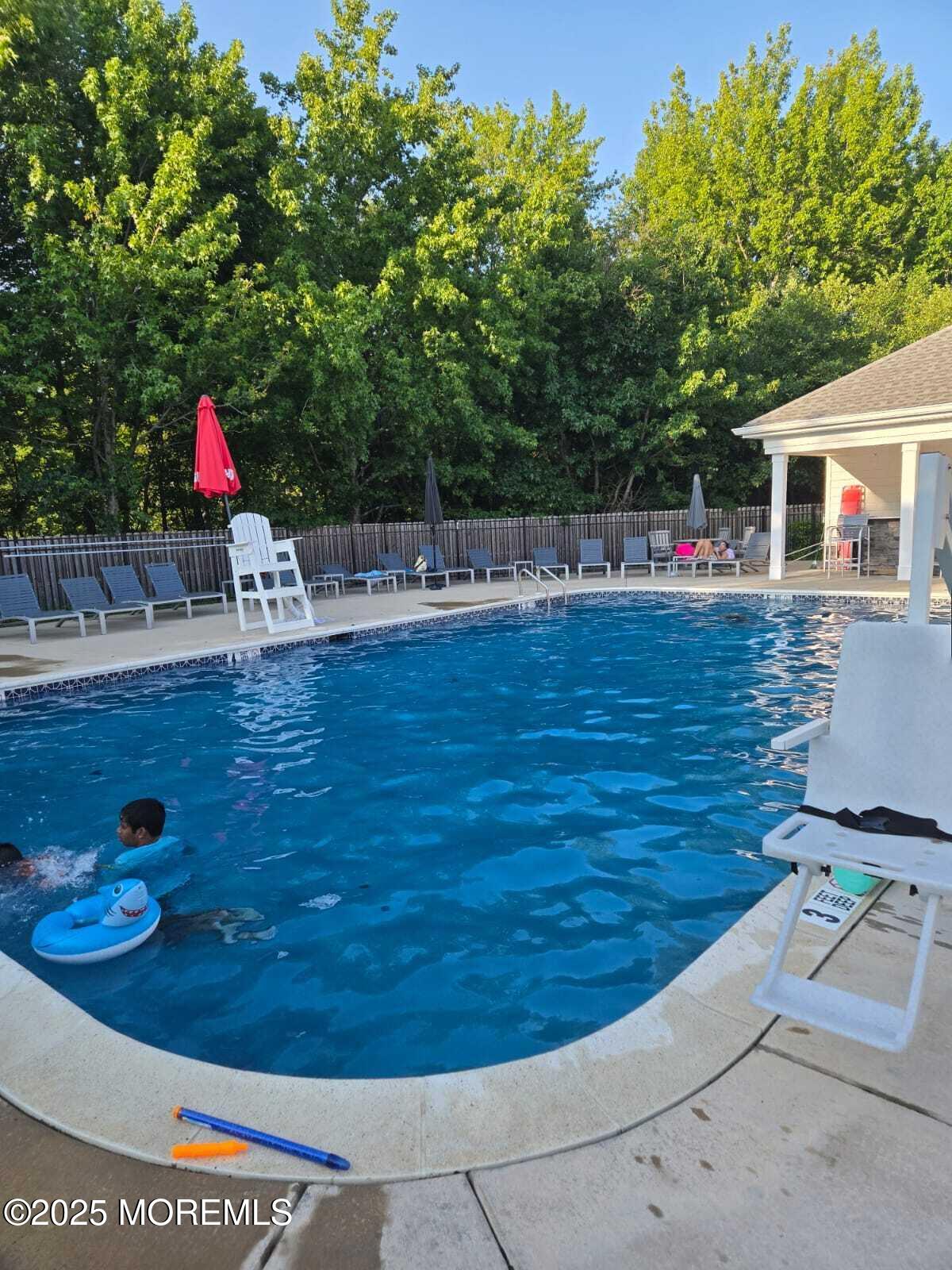 28 Radford Court, Unit 28211 Monroe Township, NJ 08831 - Photo 25 of 33 a view of a backyard with sitting area