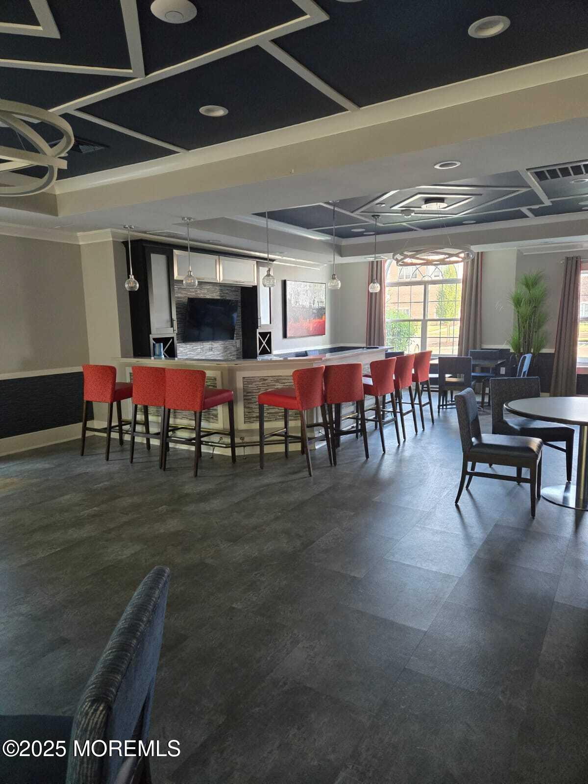 28 Radford Court, Unit 28211 Monroe Township, NJ 08831 - Photo 29 of 33 a living room with lots of furniture a rug and a fireplace