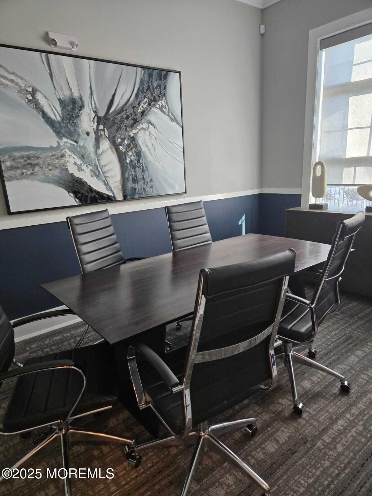 28 Radford Court, Unit 28211 Monroe Township, NJ 08831 - Photo 30 of 33 a view of a dining room with furniture and wooden floor
