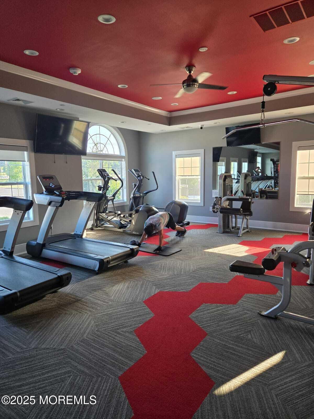 28 Radford Court, Unit 28211 Monroe Township, NJ 08831 - Photo 32 of 33 a gym hall with exercise machine