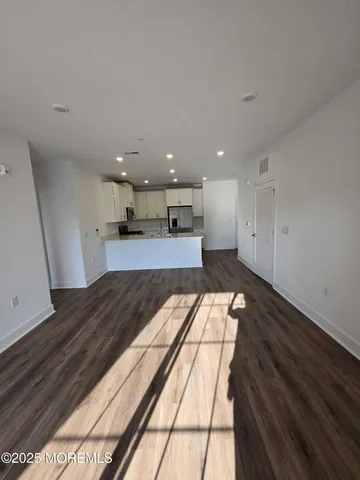 a view of kitchen with wooden floor