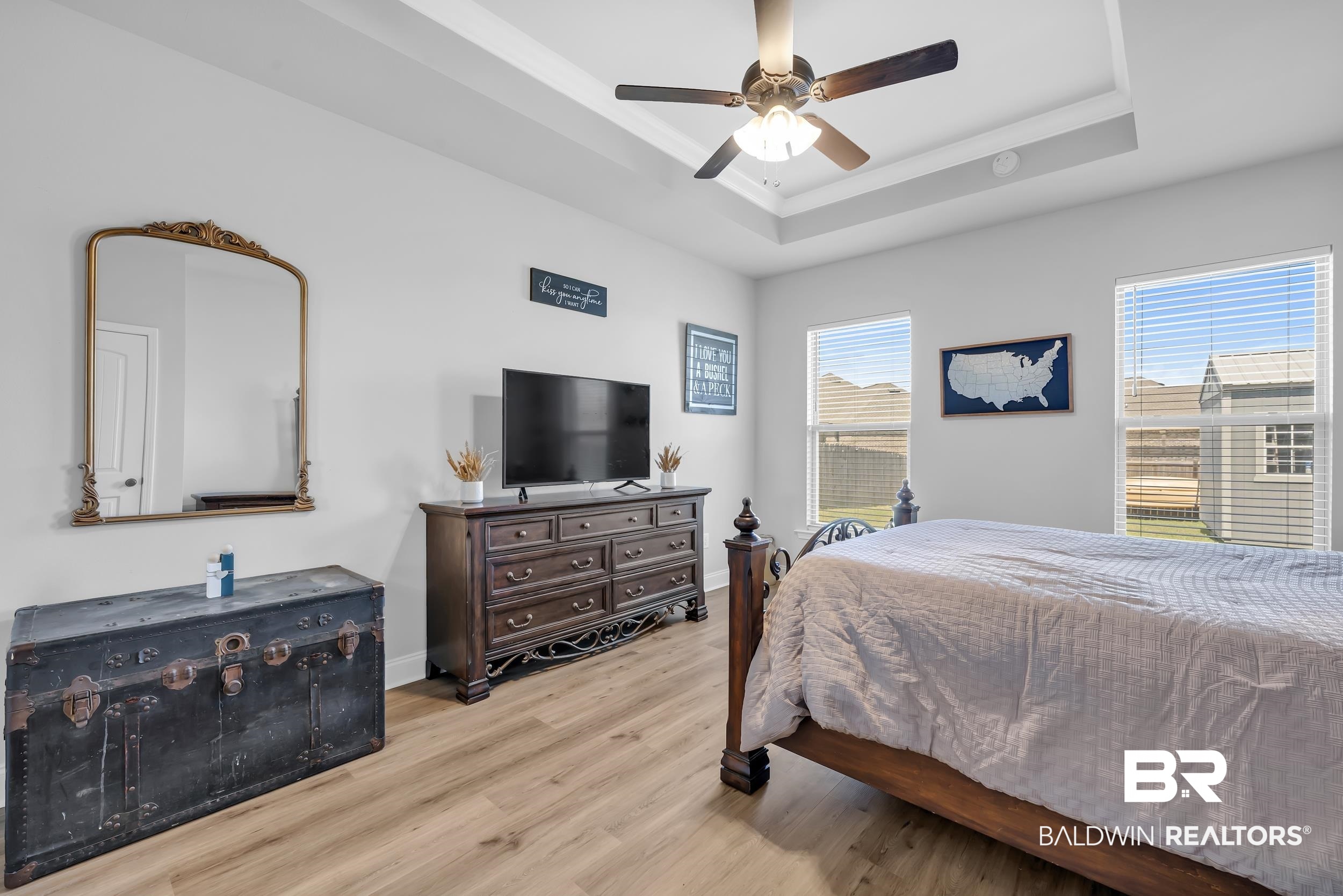 1176 Stella Road Foley, AL 36535 - Photo 18 of 40 Bedroom with wood finished floors, ceiling fan, and crown molding