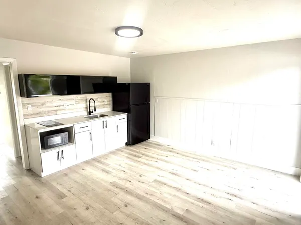 a kitchen with stainless steel appliances kitchen stove a refrigerator and a stove