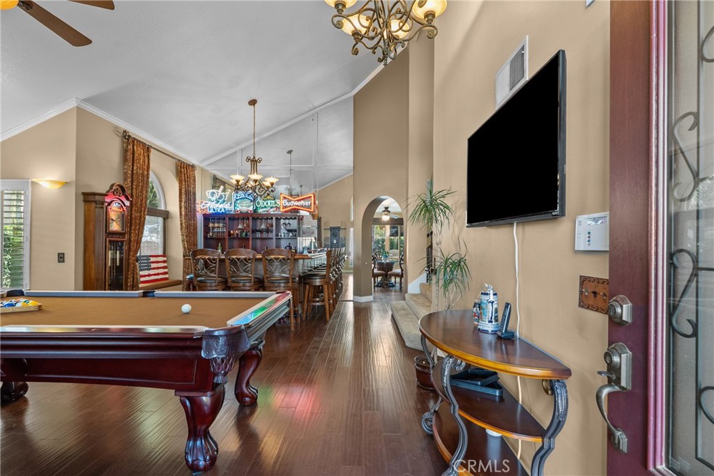 20344 Calhaven Drive Saugus, CA 91390 - Photo 14 of 70 a room with furniture and flat screen tv
