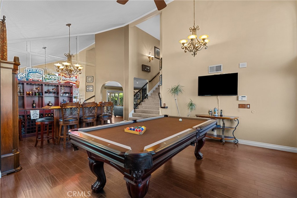 20344 Calhaven Drive Saugus, CA 91390 - Photo 19 of 70 a living room with pool table and a flat screen tv