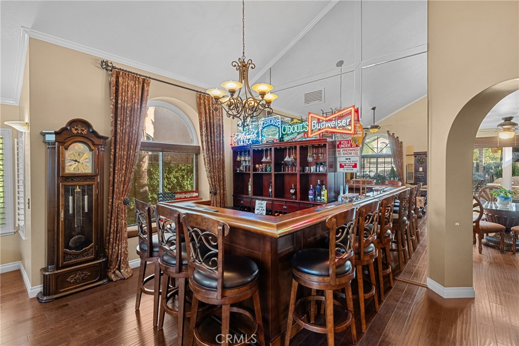 20344 Calhaven Drive Saugus, CA 91390 - Photo 20 of 70 a view of a dining room with furniture window and wooden floor