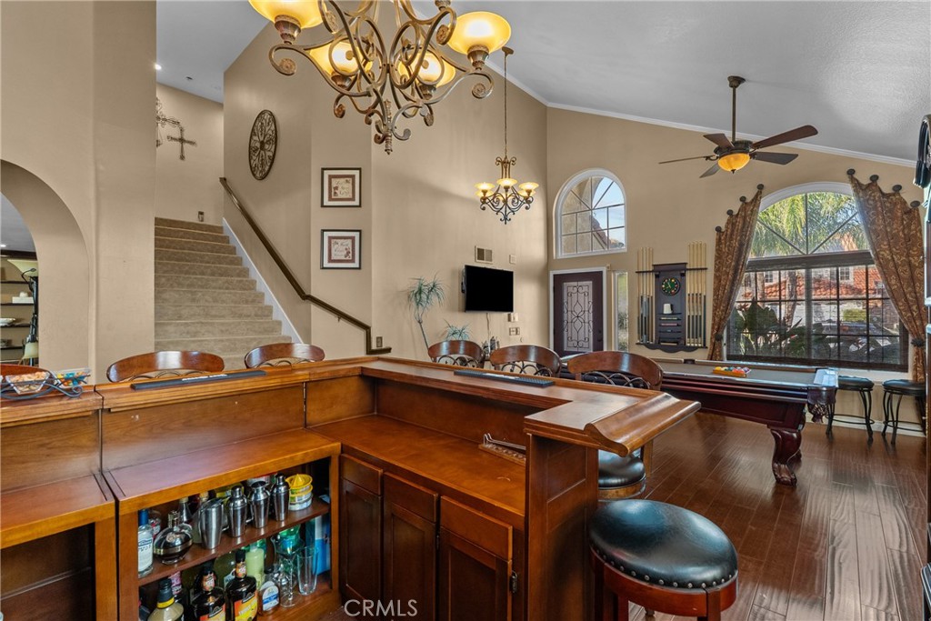 20344 Calhaven Drive Saugus, CA 91390 - Photo 23 of 70 a view of a dining room with furniture a chandelier and wooden floor