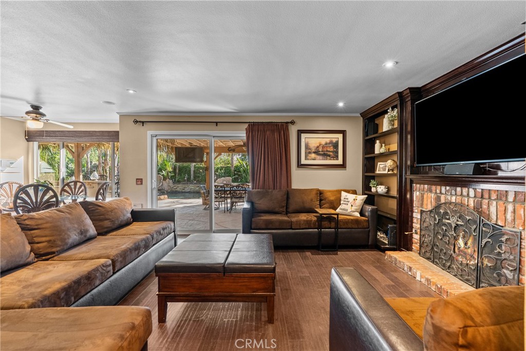 20344 Calhaven Drive Saugus, CA 91390 - Photo 33 of 70 a living room with furniture and a flat screen tv