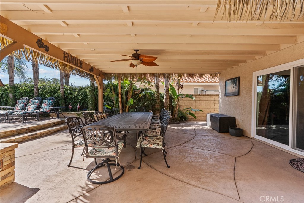 20344 Calhaven Drive Saugus, CA 91390 - Photo 50 of 70 a view of a patio with table and chairs and potted plants