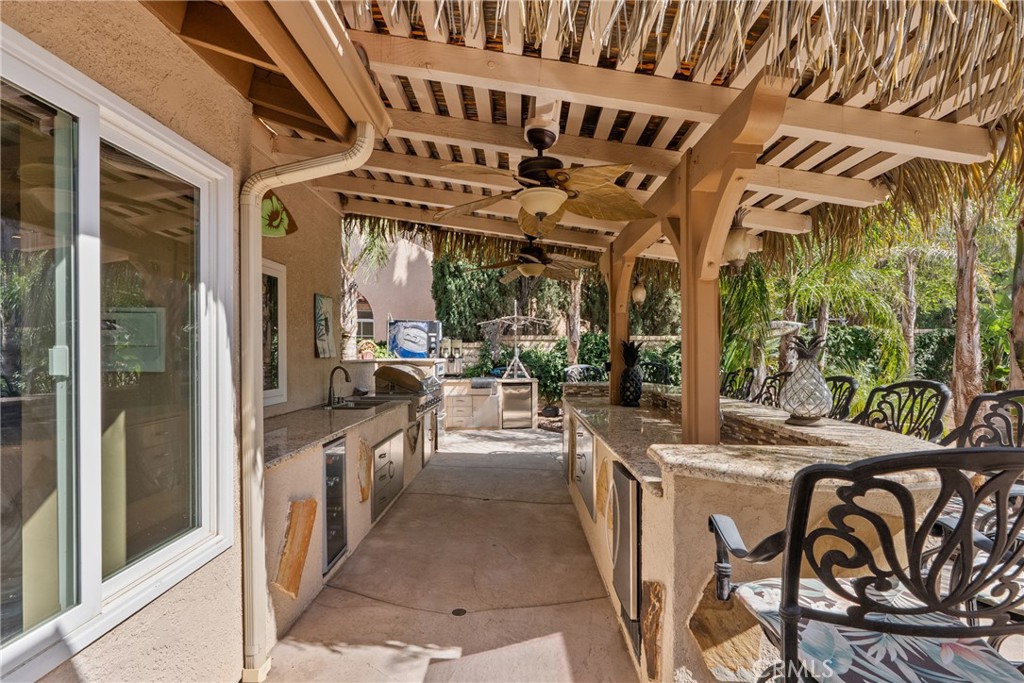 20344 Calhaven Drive Saugus, CA 91390 - Photo 53 of 70 a view of a chairs and table in a patio
