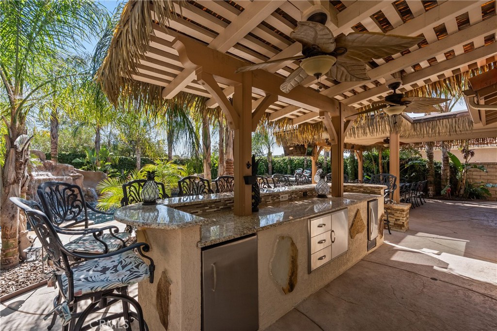 20344 Calhaven Drive Saugus, CA 91390 - Photo 56 of 70 a view of a chairs and table in the patio