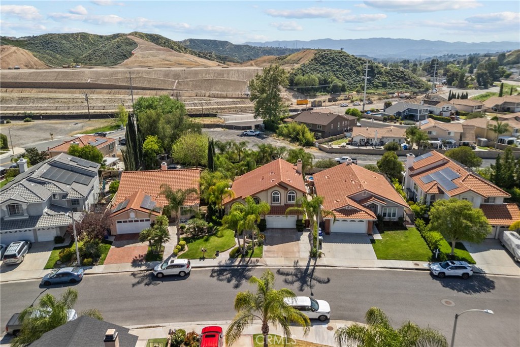 20344 Calhaven Drive Saugus, CA 91390 - Photo 66 of 70 an aerial view of residential houses with outdoor space and street view