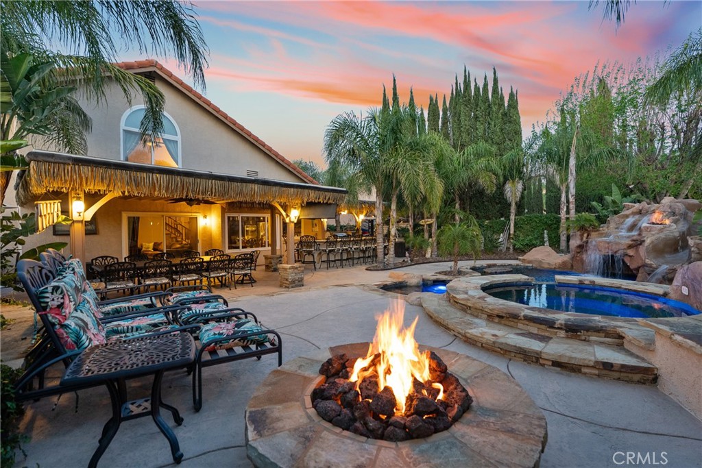 20344 Calhaven Drive Saugus, CA 91390 - Photo 7 of 70 a view of a swimming pool with a sitting space
