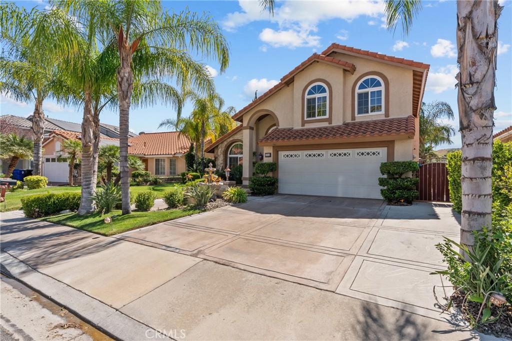 20344 Calhaven Drive Saugus, CA 91390 - Photo 10 of 70 a front view of a house with a garden