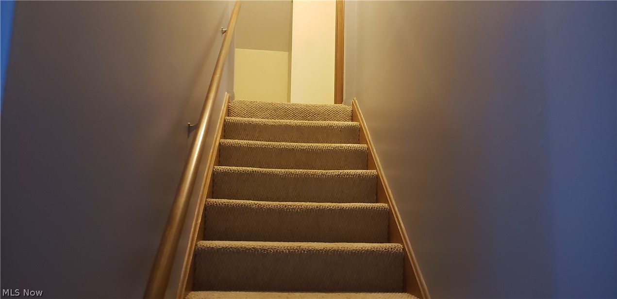 12765 Butternut Road Burton, OH 44021 - Photo 18 of 28 Go up the stairs off of the dining area