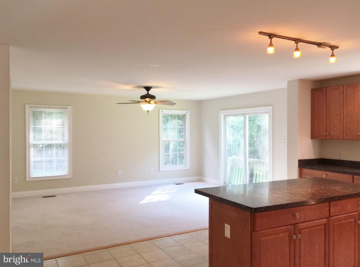 2761 Eastham Road Bumpass, VA 23024 - Photo 14 of 23 LIVING ROOM OPEN TO KITCHEN
