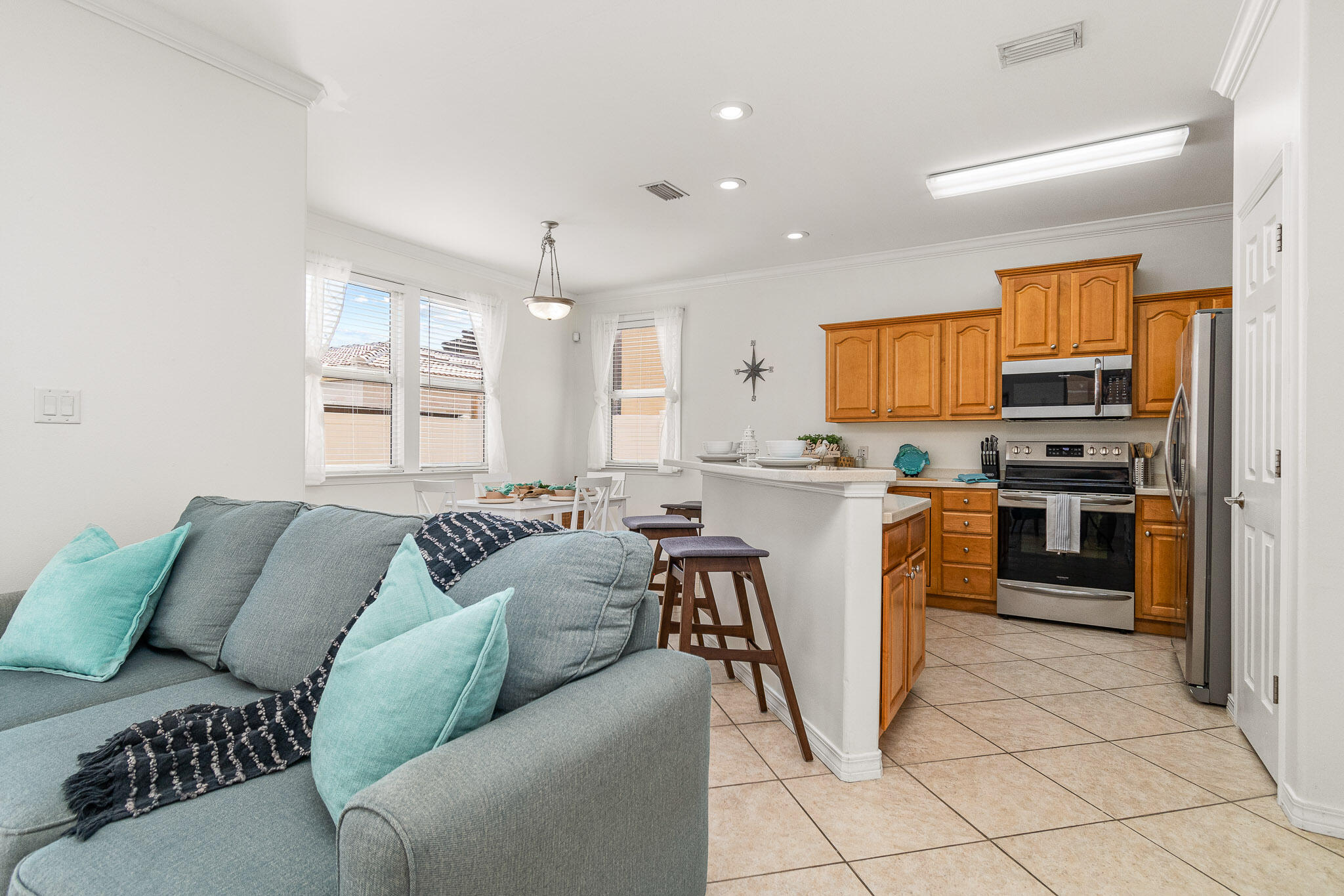 227 Inverrary Drive Destin, FL 32541 - Photo 12 of 50 a living room with furniture and a kitchen view