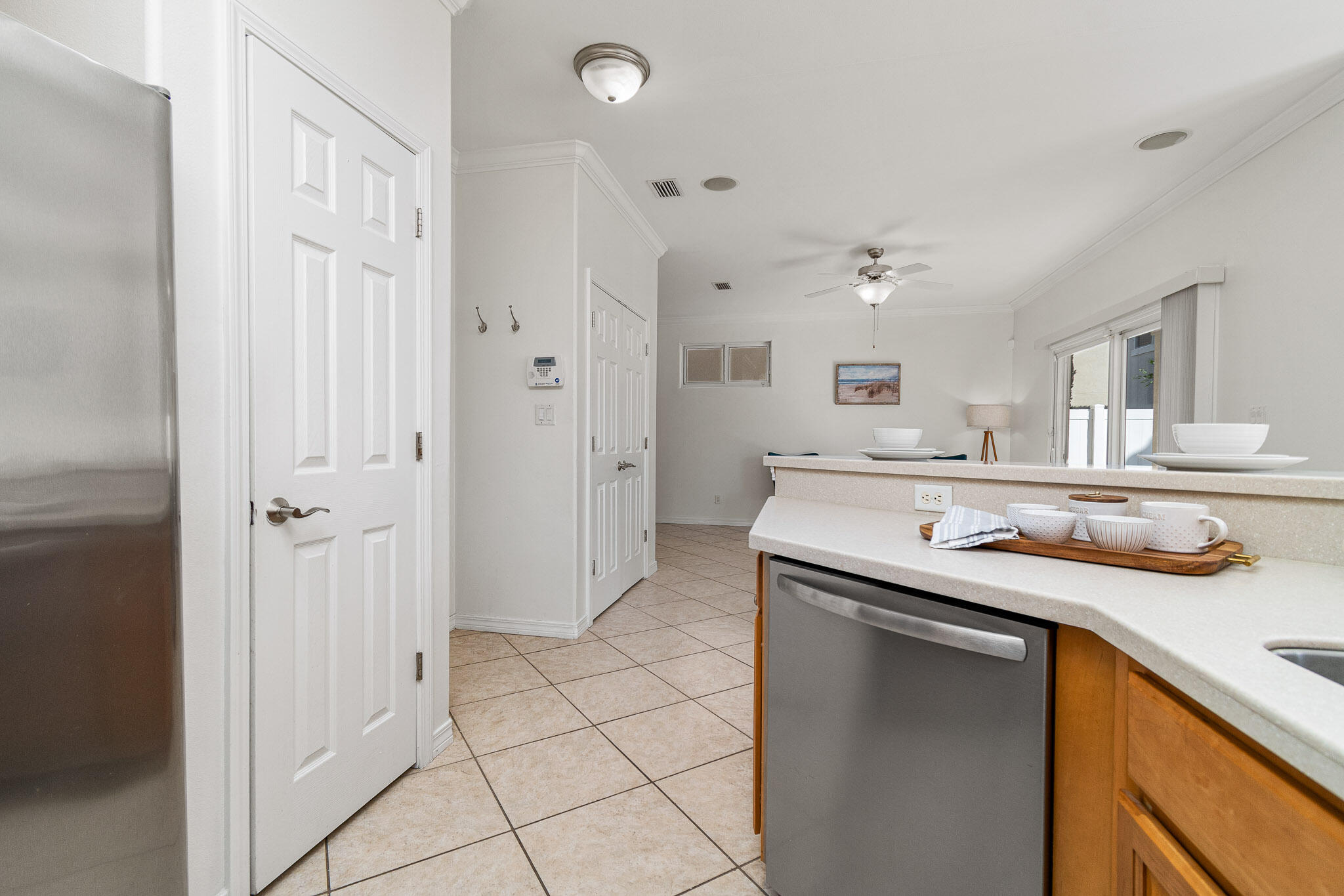 227 Inverrary Drive Destin, FL 32541 - Photo 17 of 50 a kitchen with stainless steel appliances granite countertop a sink and cabinets