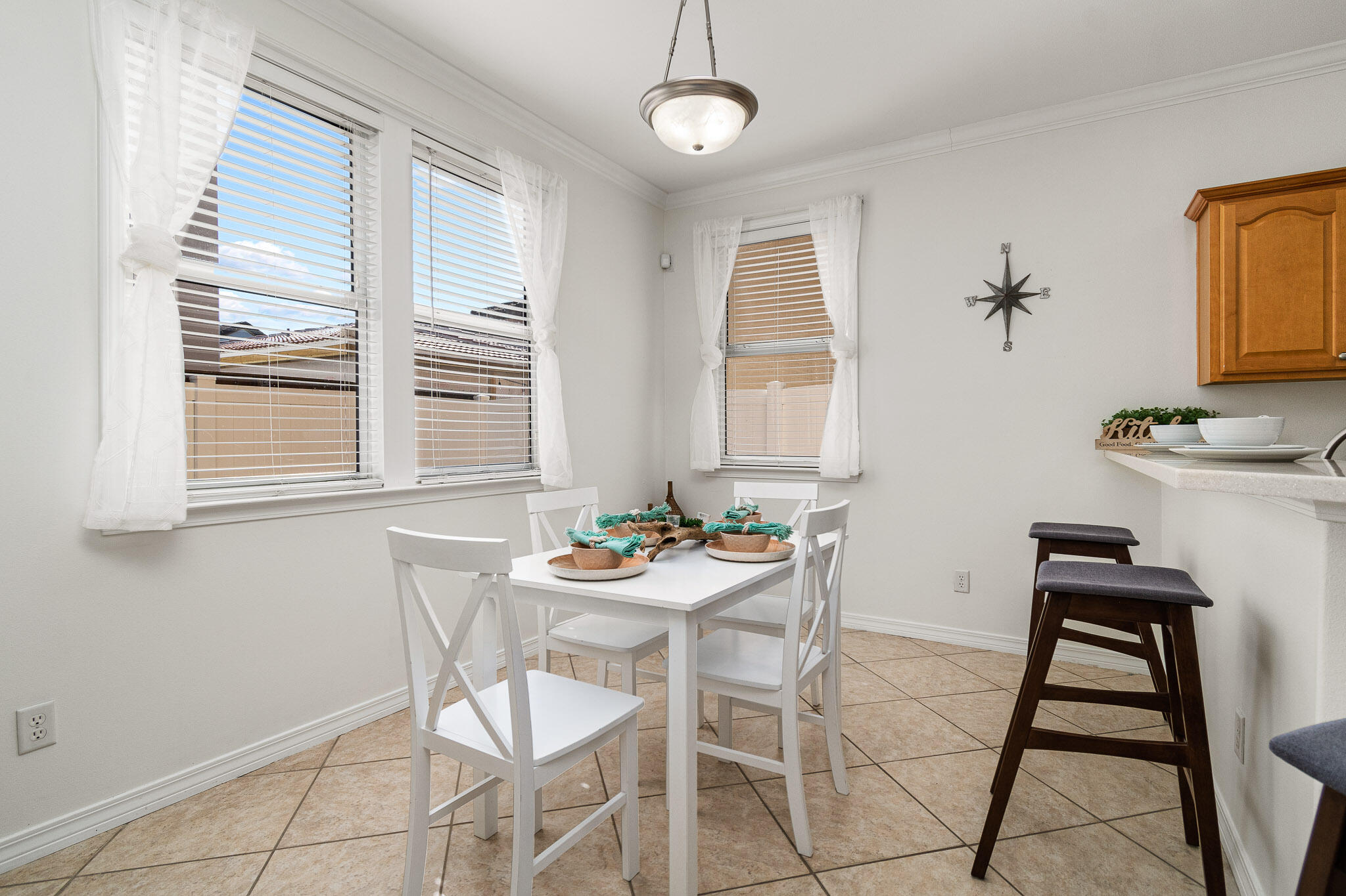 227 Inverrary Drive Destin, FL 32541 - Photo 19 of 50 a dining room with furniture and window