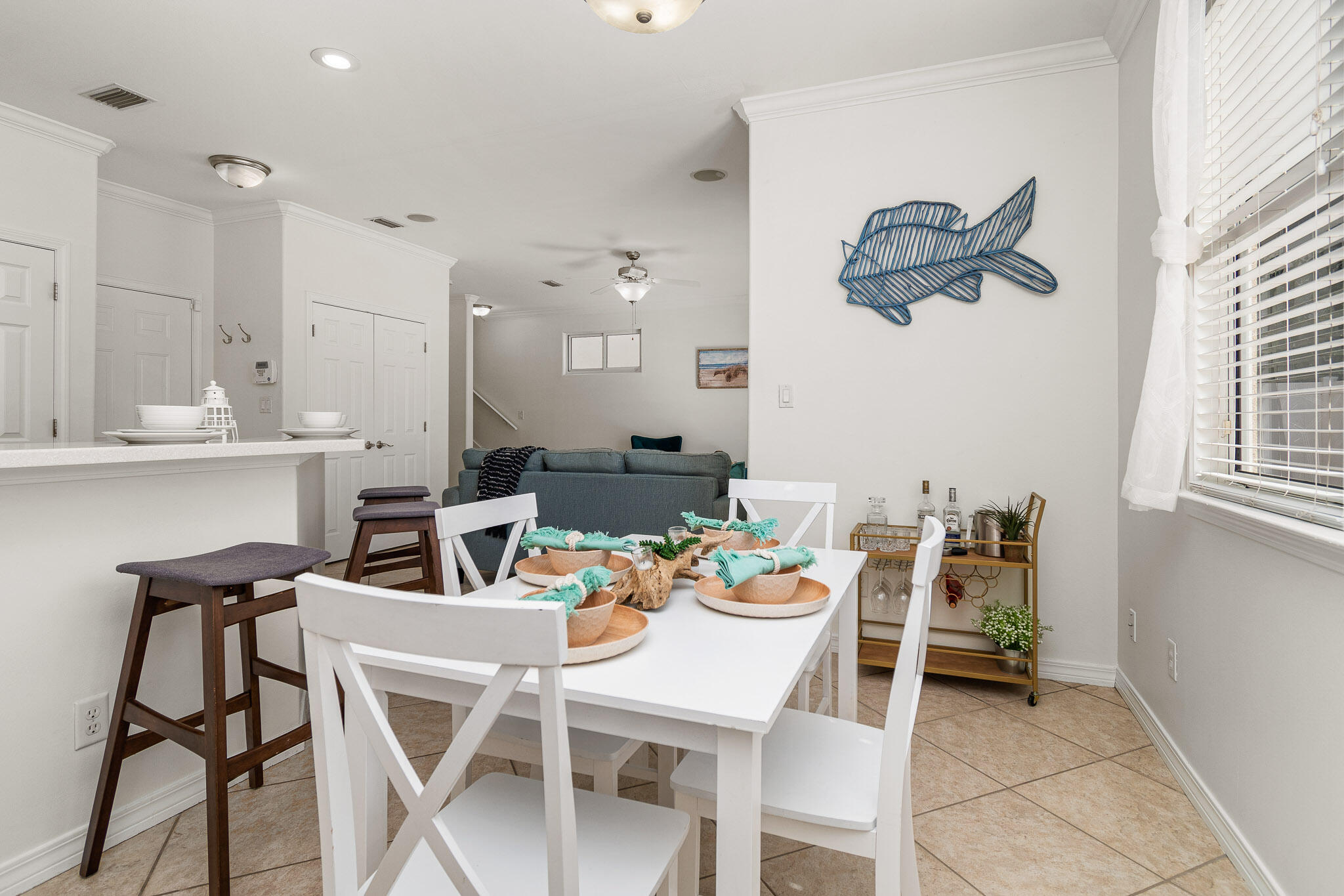 227 Inverrary Drive Destin, FL 32541 - Photo 20 of 50 a view of a dining room with furniture and wooden floor