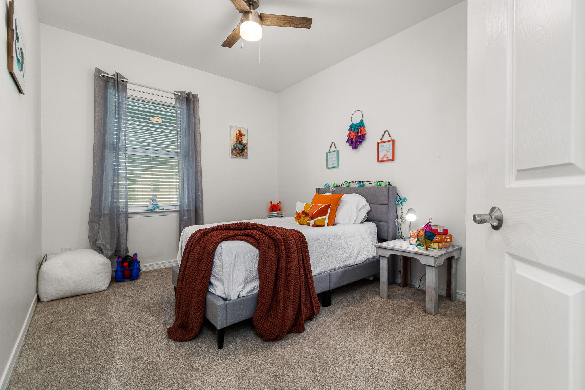 227 Inverrary Drive Destin, FL 32541 - Photo 25 of 50 a bedroom with a bed and a window