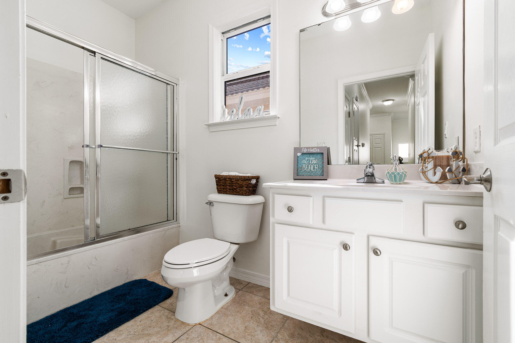 227 Inverrary Drive Destin, FL 32541 - Photo 31 of 50 a bathroom with a sink toilet vanity and shower